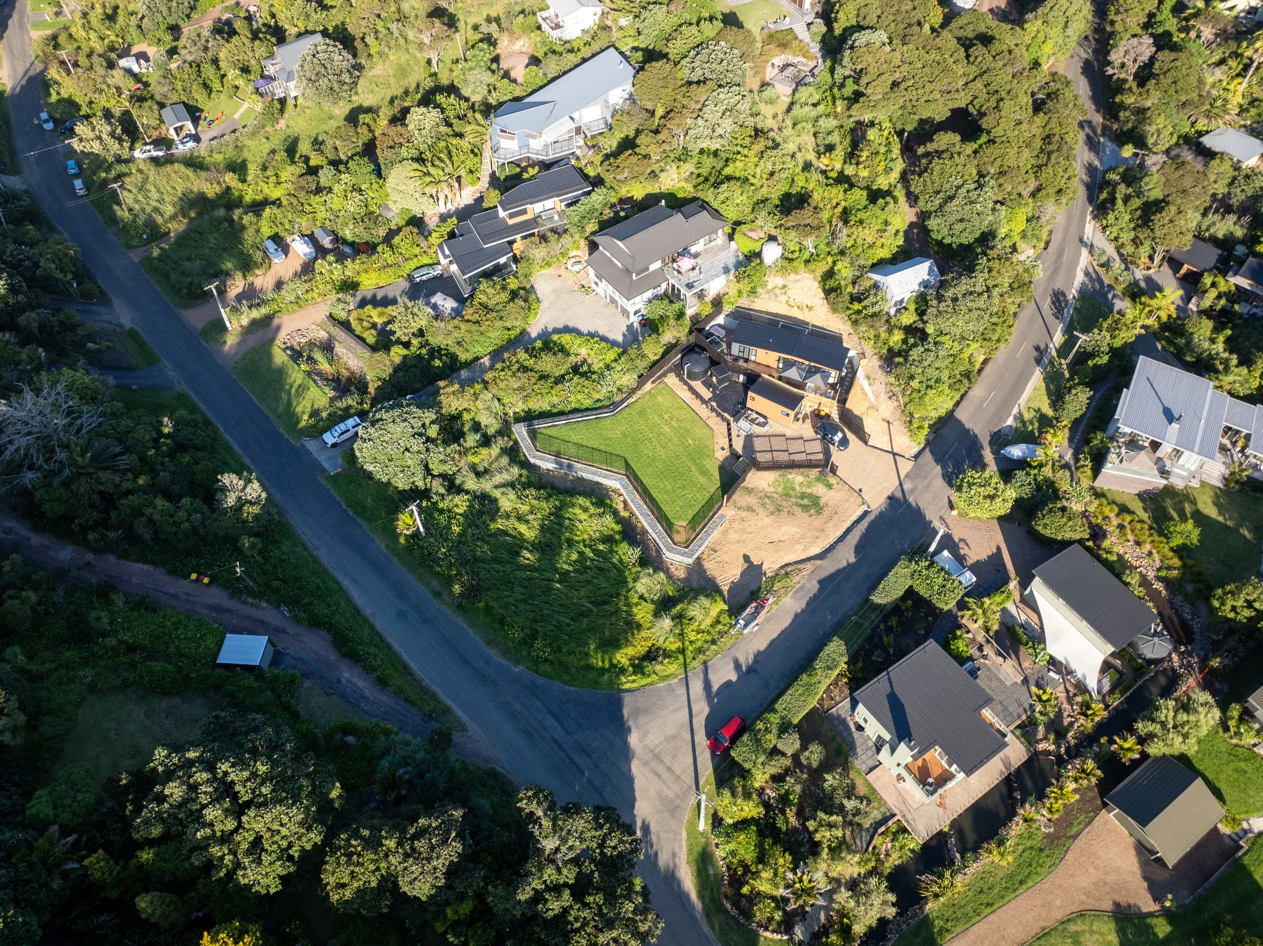 Overhead aerial showing the finished terrace in relation to the house and neighbouring sections.