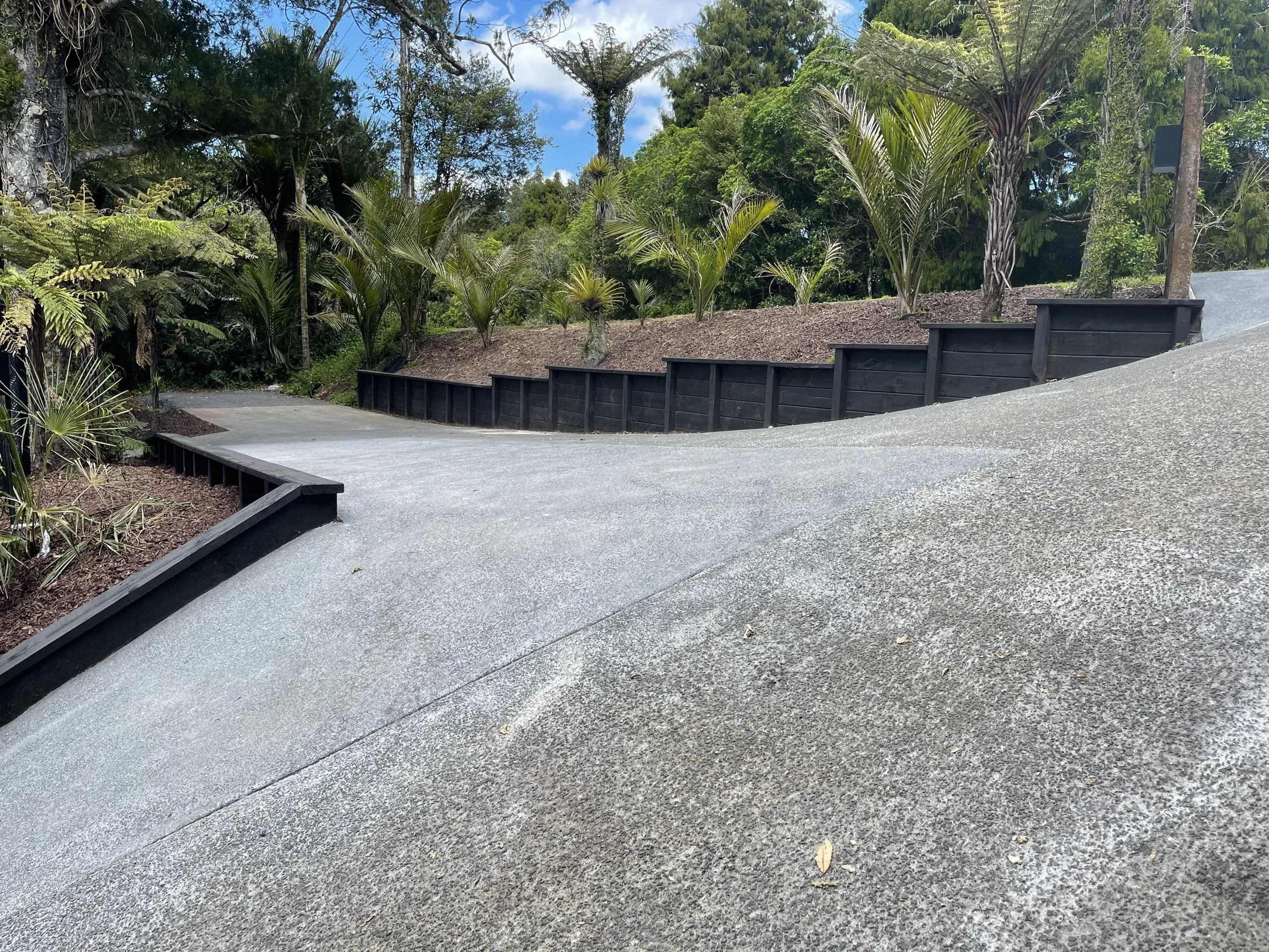 Finished timber retaining wall on a residential property